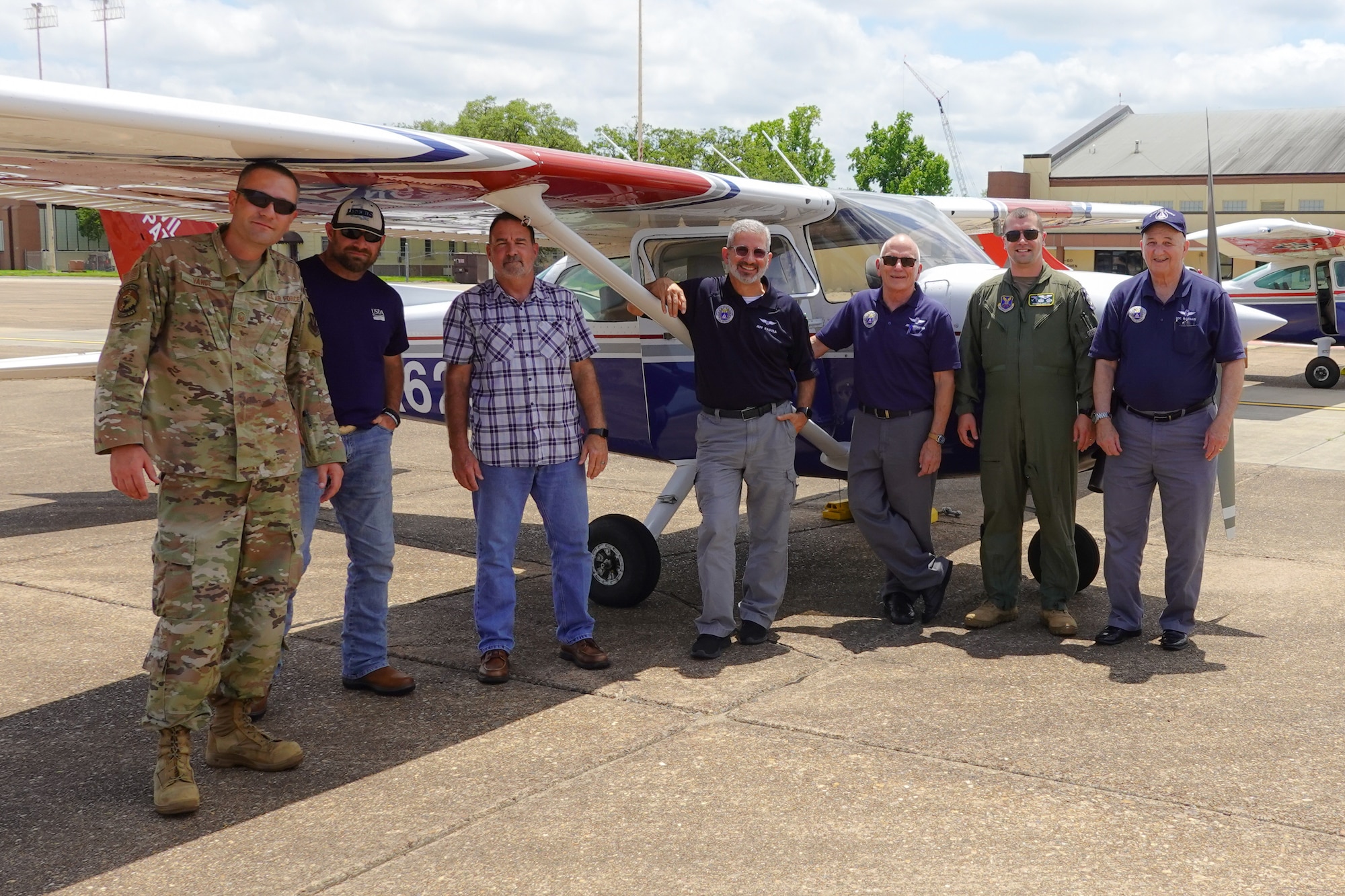Airmen from the 2nd Bomb Wing flight safety office and members from the Shreveport Civil Air Patrol, pose for a photo at Barksdale Air Force Base during a Mid-Air Collision Avoidance safety training May 28, 2021. MACA is a program where members of the flight safety office travel to various airports spreading general awareness of hazards in the area, educating local aviators by answering their questions and avoiding mid-air collisions through preparedness. (Courtesy photo by Capt. Dustin Martin)