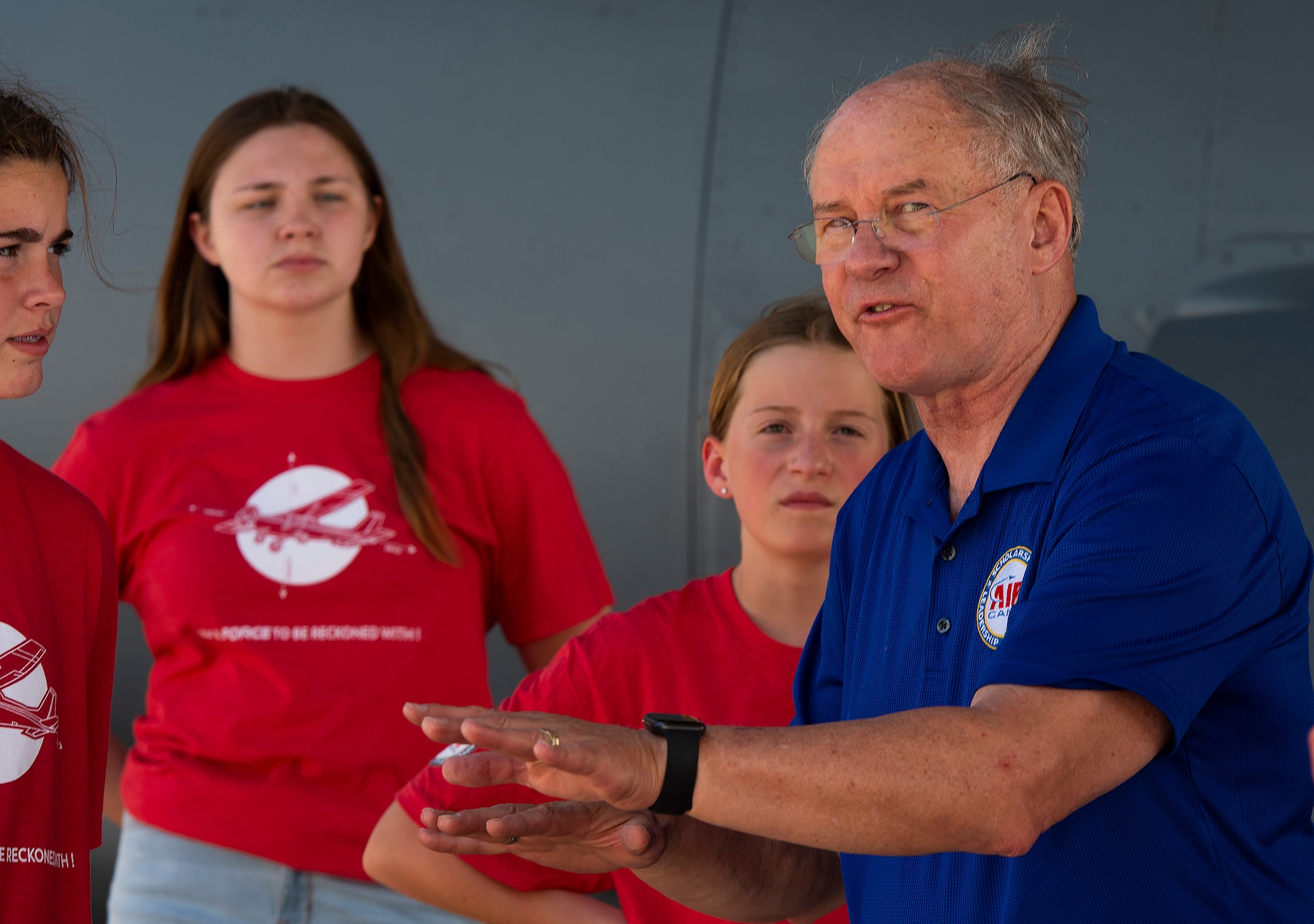 Retired Air Force Lt. Gen. Richard Reynolds talks to Air Camp participants about flying during their visit to Wright-Patterson Air Force Base, Ohio, June 14, 2021. Campers visited Wright-Patt to tour aircraft, learn about firefighting and visit the U.S. Air Force School of Aerospace Medicine. (U.S. Air Force photo by R.J. Oriez)