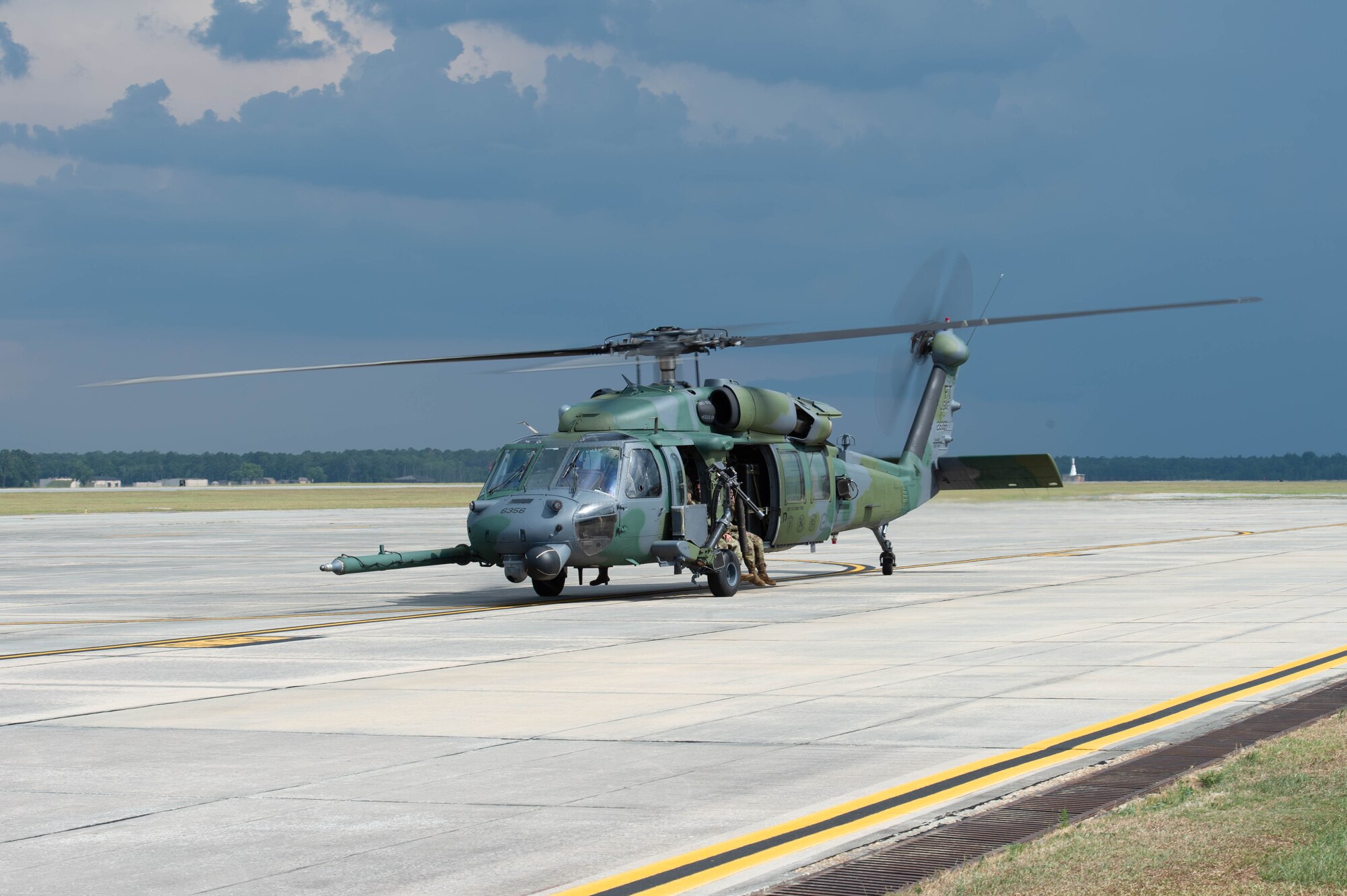 An HH-60G taxis