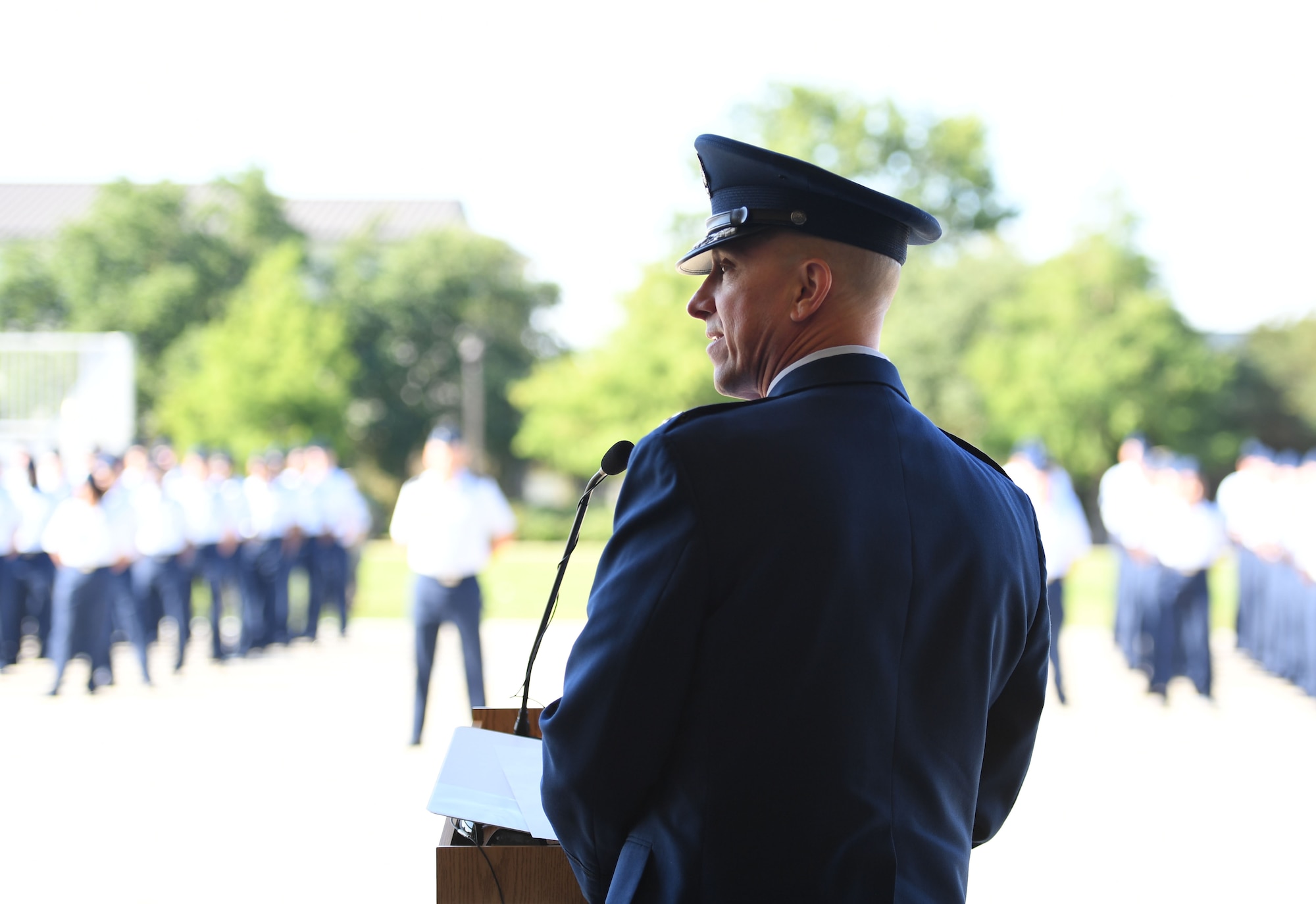 U.S. Air Force Col. William Hunter, 81st Training Wing commander, addresses his new command during a change of command ceremony on the Levitow Training Support Facility drill pad at Keesler Air Force Base, Mississippi, June 17, 2021. Hunter assumed command of the 81st TRW from Col. Heather Blackwell. (U.S. Air Force photo by Kemberly Groue)