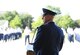 U.S. Air Force Maj. Gen. Andrea Tullos, Second Air Force commander, passes the guidon to Col. William Hunter, 81st Training Wing commander, during a change of command ceremony on the Levitow Training Support Facility drill pad at Keesler Air Force Base, Mississippi, June 17, 2021. The ceremony is a symbol of command being exchanged from one commander to the next. Hunter assumed command of the 81st TRW from Col. Heather Blackwell. (U.S. Air Force photo by Kemberly Groue)