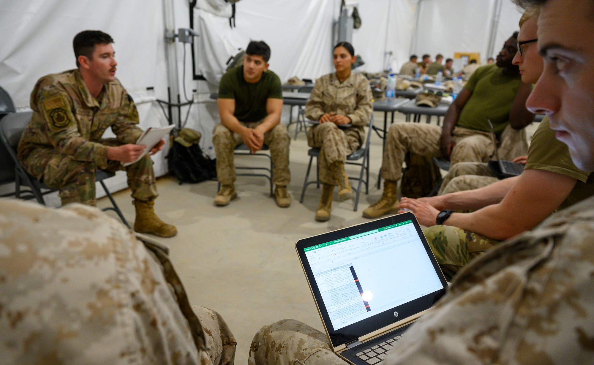 Airman giving presentation to his group.