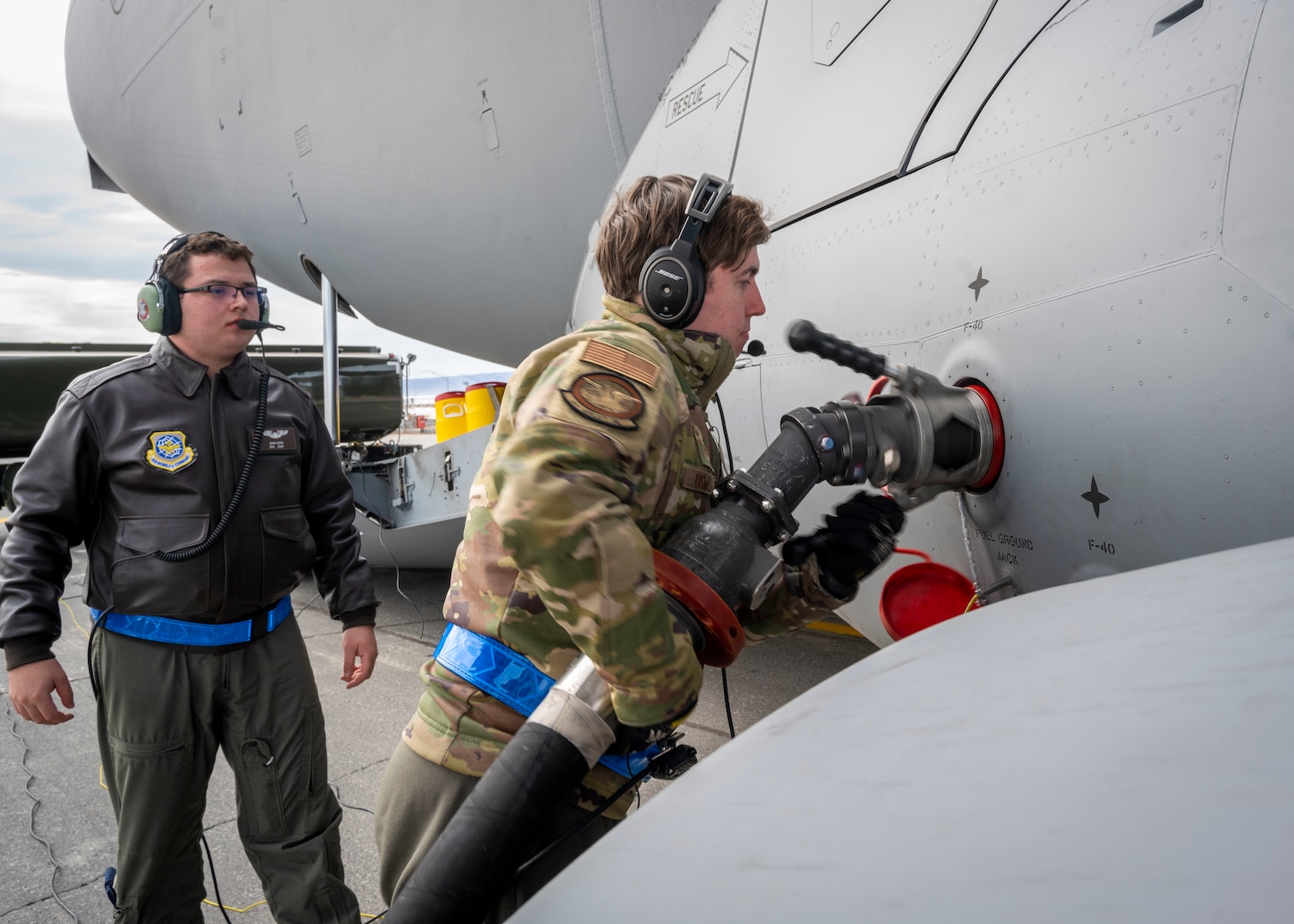 U.S. Air Force Airmen assigned to the 140th Wing and 4th Airlift Squadron preform a wet-wing defuel during exercise Amalgam Dart 21-01, June 16, 2021 at Thule Air Base, Greenland.