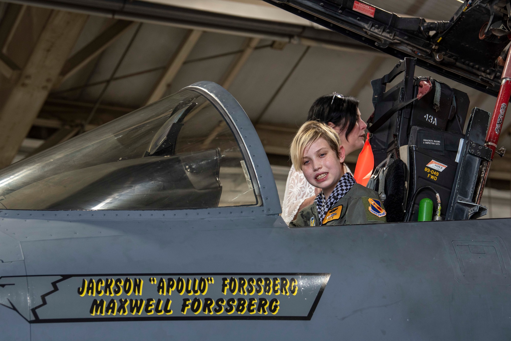 Jackson Forrsberg, who selected as a Pilot for a Day, sits in an F-15E Strike Eagle at Seymour Johnson Air Force Base, North Carolina, June 17, 2021.