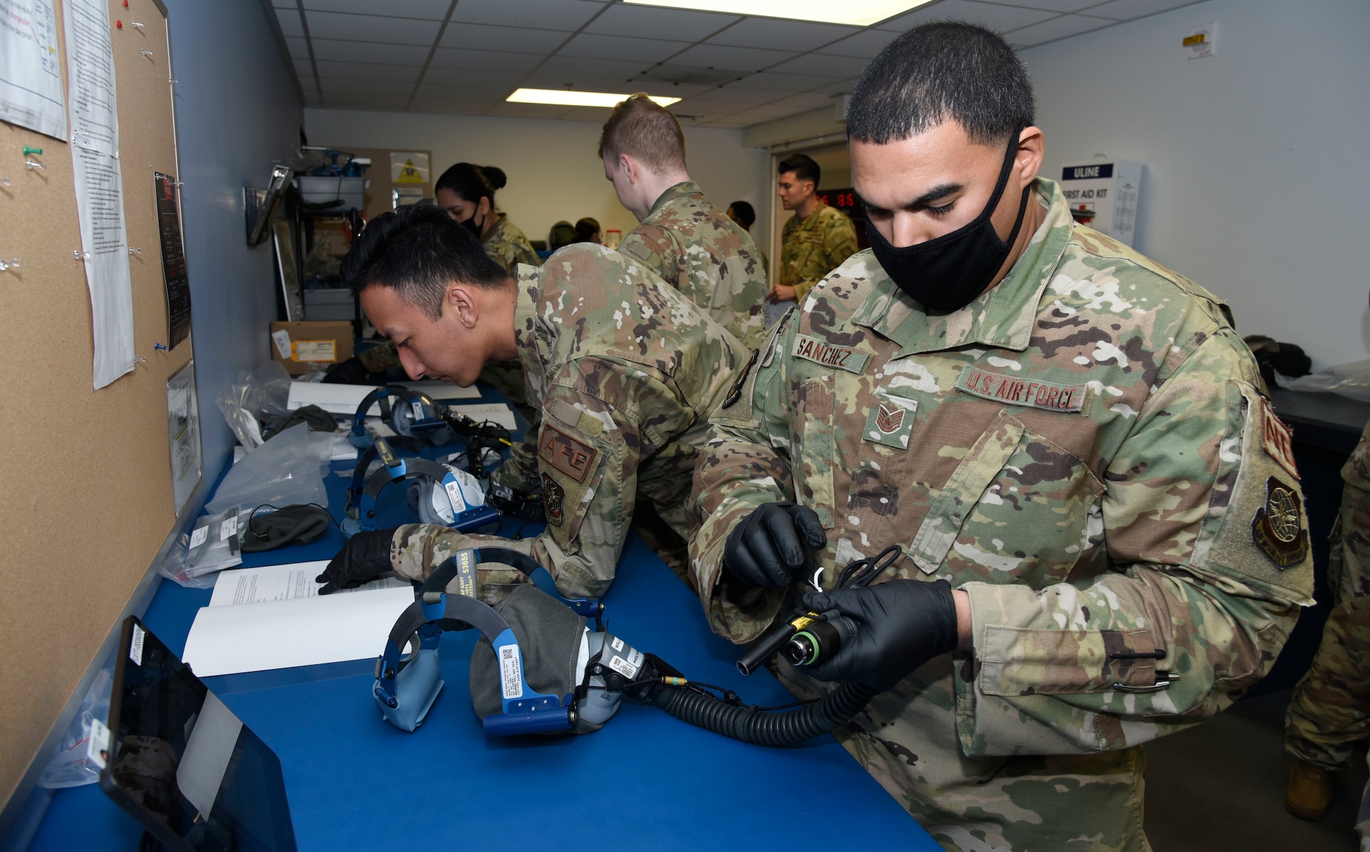 Airmen from the 436th Operations Support Squadron aircrew flight equipment test capabilities of the upgraded 358 Quick Don Demist oxygen masks at Dover Air Force Base, Delaware, June 14, 2021. The newly modified masks were tested against legacy masks to identify any deficiencies regarding previously identified fogging issues to Air Mobility Command. (U.S. Air Force photo by Tech. Sgt. Nicole Leidholm)