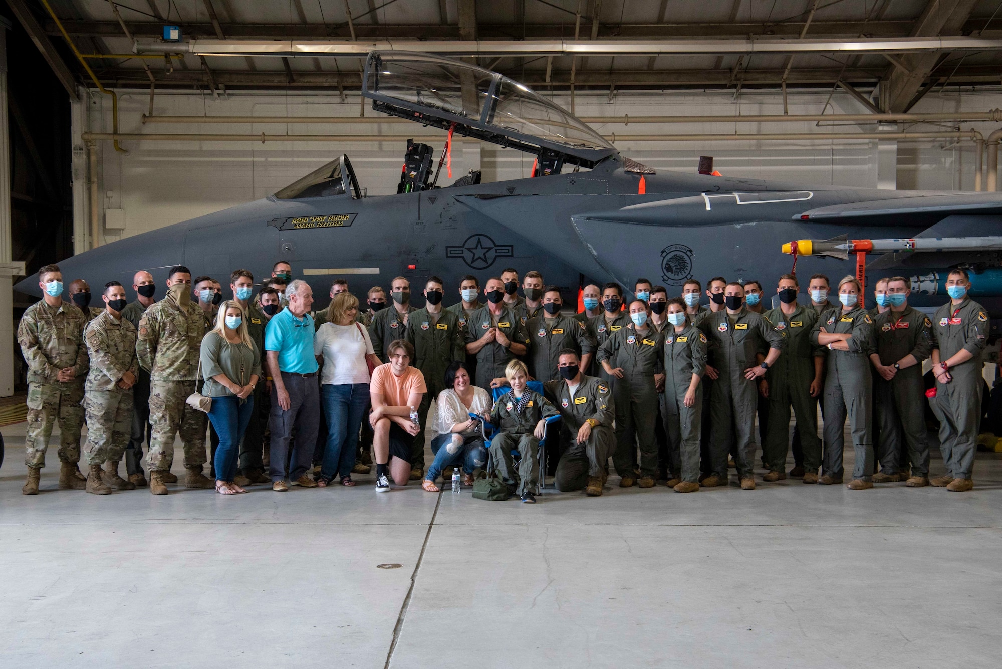 Pilot for a Day participants, Jackson Forrsberg and his family gather for a group photo during Pilot for a Day event at Seymour Johnson Air Force Base, North Carolina, June 17, 2021.