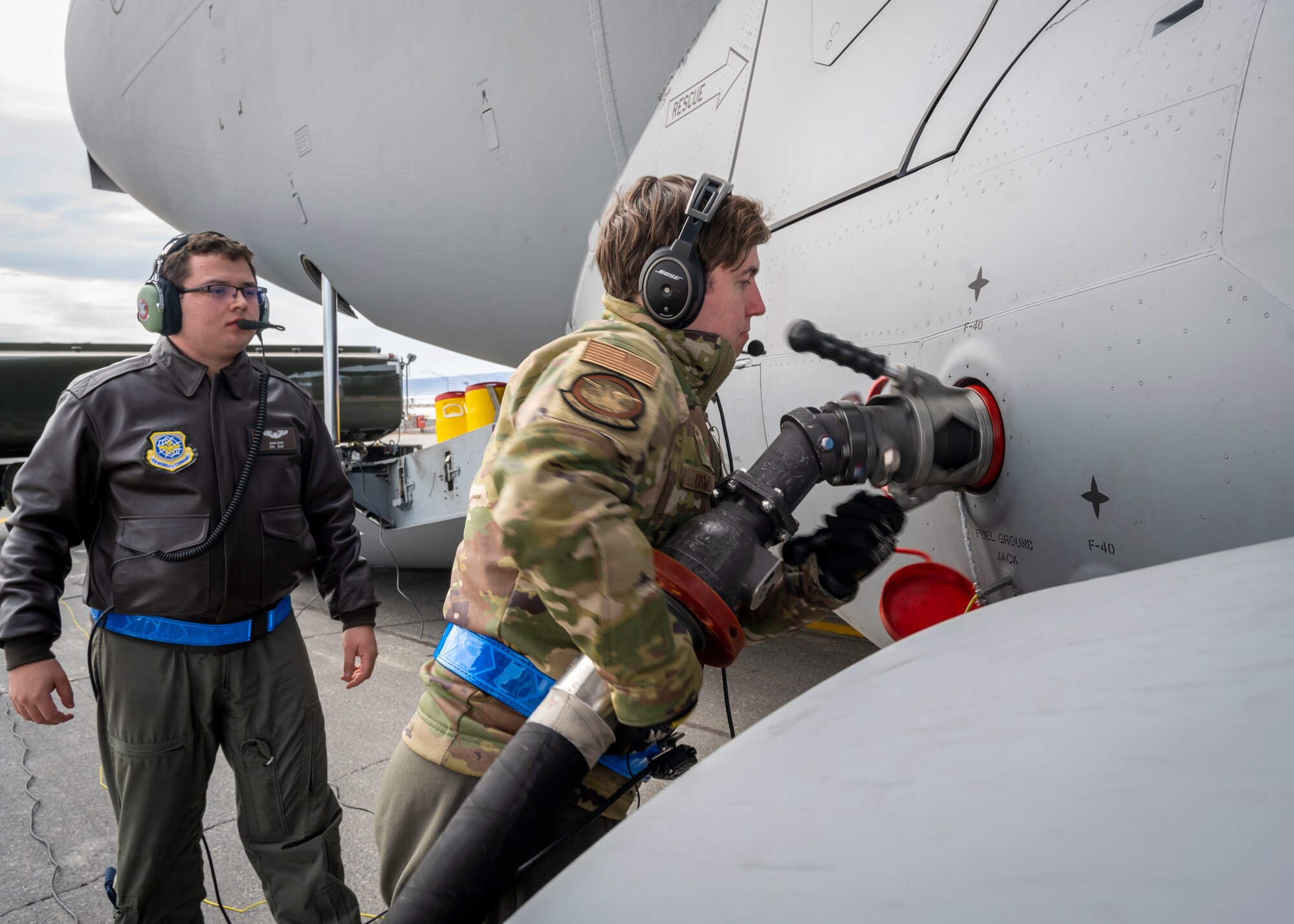 U.S. Air Force Airmen assigned to the 140th Wing and 4th Airlift Squadron preform a wet-wing defuel during exercise Amalgam Dart 21-01, June 16, 2021 at Thule Air Base, Greenland.