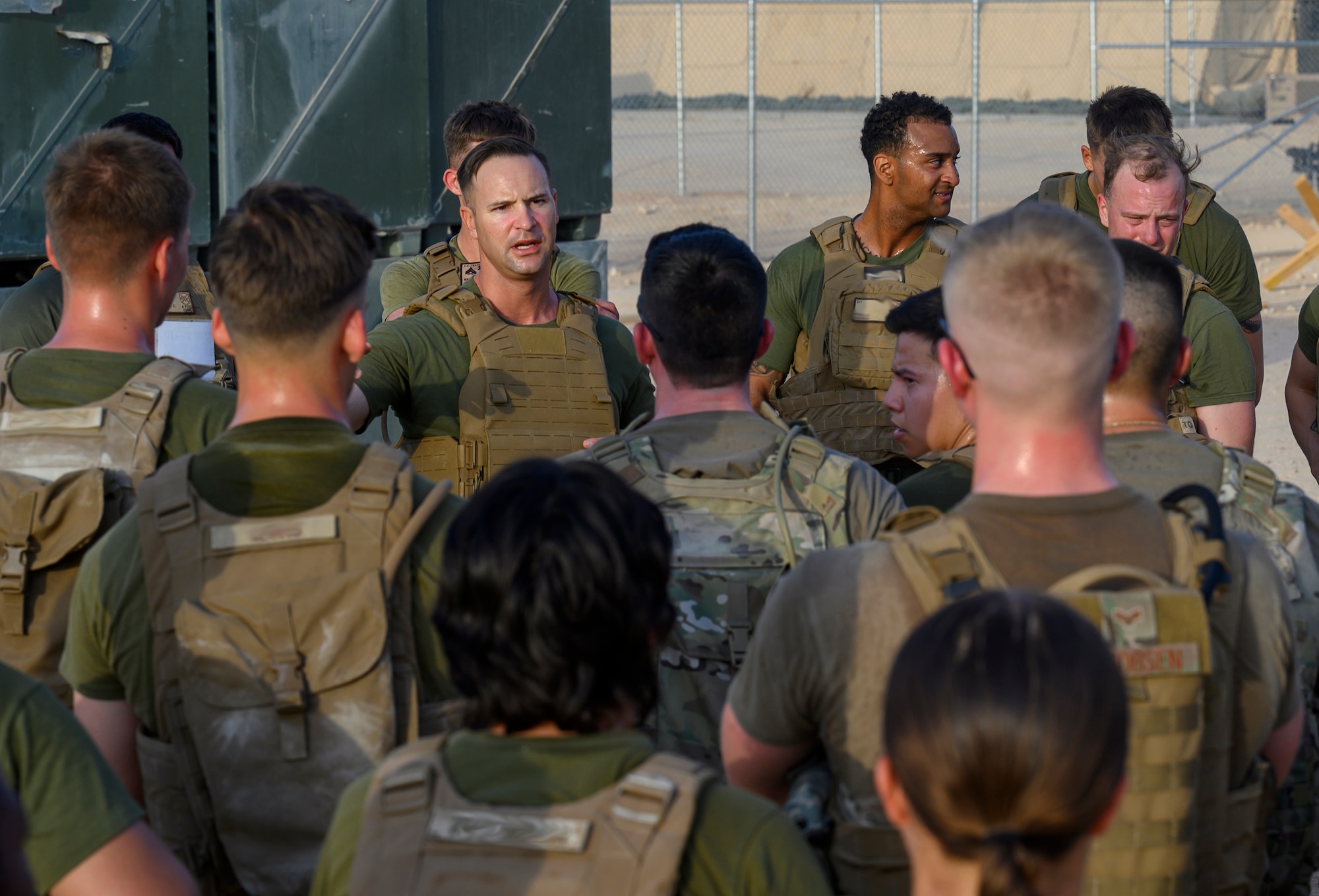 Instructor talks to trainees.