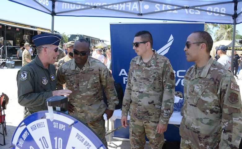 Maj. Gen. Matthew Burger, Air Force Reserve Command deputy commander, talks to a group of Reserve recruiters from Homestead Air Reserve Base, Florida, during  the Miami Beach Air Show, May 28, 2021
