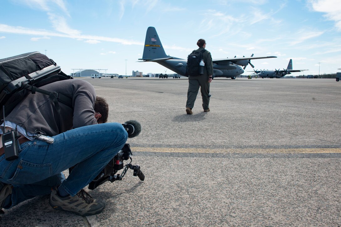 1st Lt. Alexandra Pagoni, a pilot assigned to the 118th Airlift Squadron, participates in a video shoot for a commercial to promote the Air National Guard, April 7, 2021 at Bradley Air National Guard Base, Connecticut. The commercial, part of the ‘Serve Your Way’ campaign, highlights how and why Air National Guard members serve in the Guard. (U.S. Air National Guard photo by Master Sgt. Tamara R. Dabney)