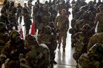 Tech. Sgt. Adam Carder, a firefighter with the 167th Civil Engineering Squadron, checks on Airmen as they don their mission-oriented protective posture gear during chemical, biological, radiological, nuclear (CBRN) defense training at the 167th Airlift Wing, Martinsburg, West Virginia, June 12, 2021. The CBRN training was offered in four sessions over the 167th AW’s four-day training assembly held, June 10-13, enabling more than 200 Airmen to meet the expeditionary skills training requirement.