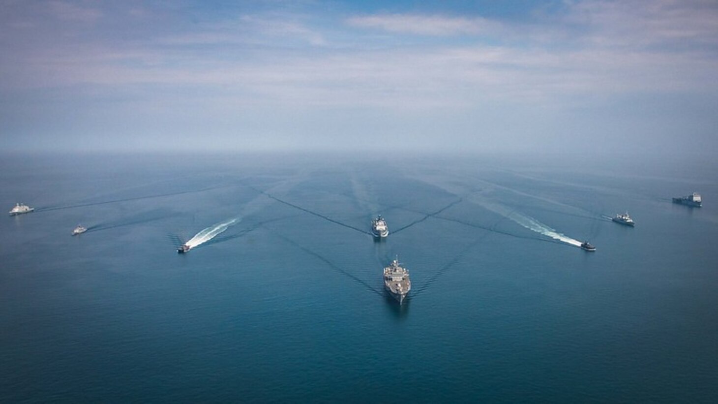 Standing NATO Maritime Group One (SNMG1) ships HMCS Halifax, HDMS Absalon, FS Commandant Blaison, HNoMS Storm and HNoMS Gnist participate in a PHOTOEX with RFA Mounts Bay and HMS Albion off the coast of Denmark on June 6th, 2021 during Exercise BALTOPS 50. BALTOPS is an annual joint, multinational maritime-focused defence exercise designed to enhance interoperability, flexibility, and demonstrate resolve among Allied and partner forces to defend the Baltic Sea Region. It involves maritime and air forces, strengthening combined response capabilities necessary to ensure regional security and stability.