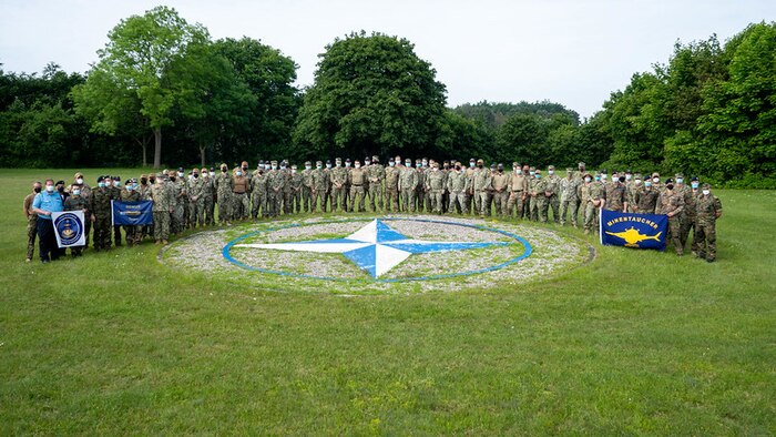 210607-M-FX541-1001
PUTLOS, Germany (June 7, 2021) Allied forces, pose for a group photo during the start of Baltic Operations (BALTOPS) 2021, June 8, 2021. The 50th BALTOPS represents a continuous, steady commitment to reinforcing interoperability in the Alliance and providing collective maritime security in the Baltic Sea. (U.S. Marine Corps photo by Cpl. Robin Lewis)