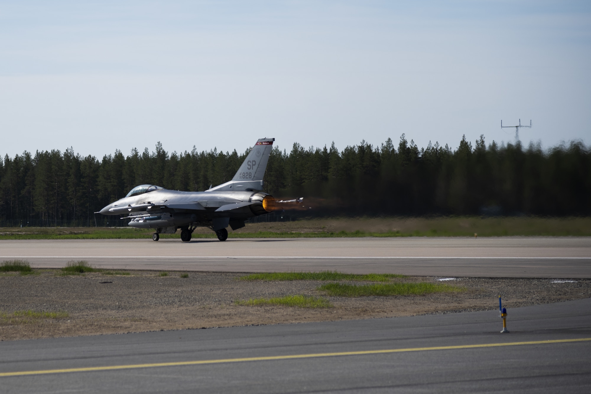 A U.S. Air Force F-16 from the 480th Fighter Squadron at Spangdahlem Air Base, Germany, takes off from the runway at Kallax Air Base, Sweden, June 8, 2021. Airmen from the 52nd Fighter Wing deployed to Sweden to participate in the Norwegian-led Arctic Challenge Exercise 2021 with  NATO and nordic allies. (U.S. Air Force photo by Senior Airman Ali Stewart)