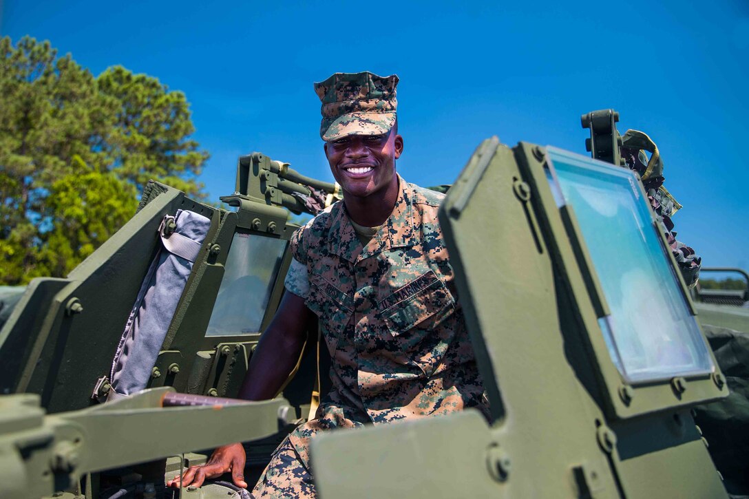 Pfc. Quintravious D. Russ, a motor transport operator with 2nd Amphibious Assault Battalion, 2d Marine Division, poses for a photo on Camp Lejeune, N.C., June 16, 2021. “Always go out and learn, so you can protect what you’ve earned,” said Russ, an Albany, GA., native. According to his leadership, Russ has been assigned as the quality assurance and line NCO assistant, due to his high level of professionalism, work ethic and eagerness to enhance his skills within his MOS. Russ has recently completed the advance operator’s JLTV Course and AMMO course, providing more services to his platoon and the battalion. Russ continually motivates his platoon by demanding more of himself and of his fellow Marines, while also setting the example of Espirit de Corps within the battalion. Russ’s leadership is also looking at him for a potential meritorious promotion and higher billet responsibilities. (U.S. Marine Corps photo by Lance Cpl. Emma Gray)