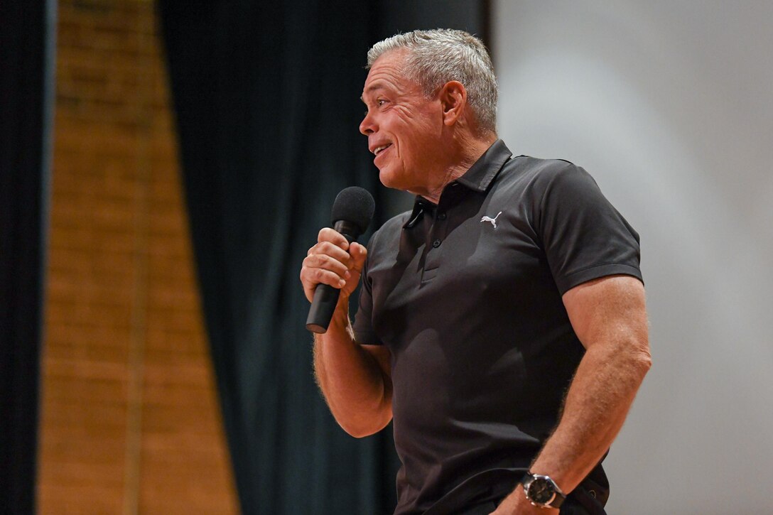 Bernie McGrenahan, a stand-up comedian and motivational speaker, performs “Comedy is the Cure” to military members for the first time in over 18 months on June 15, 2021, in the base theatre at F.E. Warren Air Force Base, Wyoming. He delivers the original comedy with a message, using humor followed by his personal life testimony to demonstrate the negative outcomes of alcohol dependence and the importance of staying resilient. (U.S. Air Force photo by Airman 1st Class MacIlvaine)