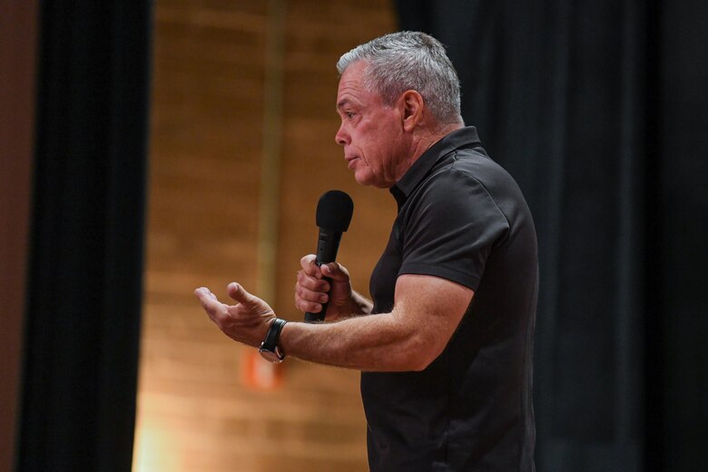 Bernie McGrenahan, a stand-up comedian and motivational speaker, performs “Comedy is the Cure” to military members for the first time in over 18 months on June 15, 2021, in the base theatre at F.E. Warren Air Force Base, Wyoming. He delivers the original comedy with a message, using humor followed by his personal life testimony to demonstrate the negative outcomes of alcohol dependence and the importance of staying resilient. (U.S. Air Force photo by Airman 1st Class Faith Iris MacIlvaine)