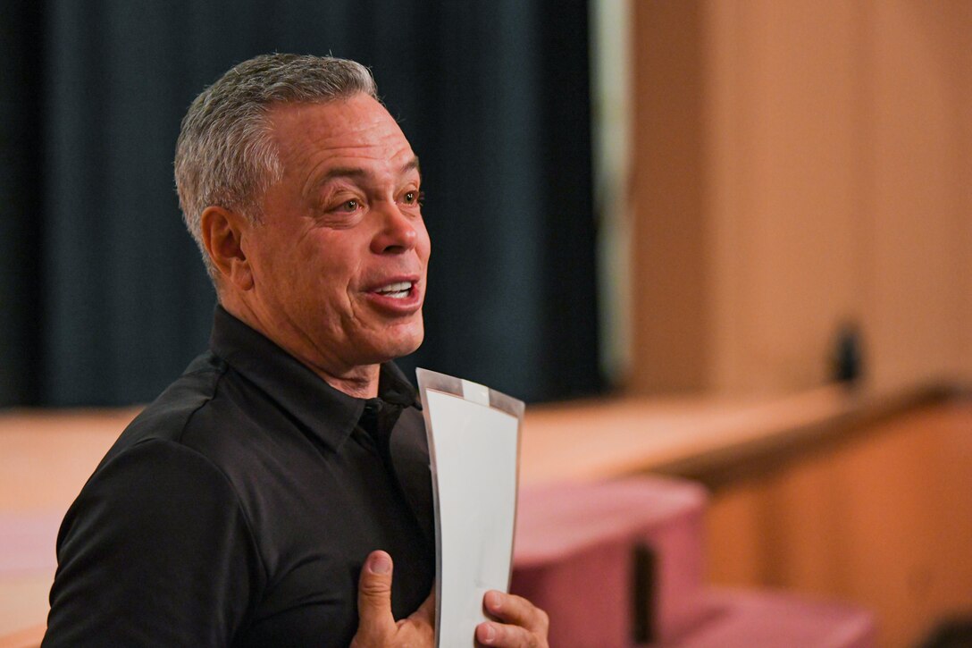 Bernie McGrenahan, a stand-up comedian and motivational speaker, performs “Comedy is the Cure” to military members for the first time in over 18 months on June 15, 2021, in the base theatre at F.E. Warren Air Force Base, Wyoming. He delivers the original comedy with a message, using humor followed by his personal life testimony to demonstrate the negative outcomes of alcohol dependence and the importance of staying resilient. (U.S. Air Force photo by Airman 1st Class Faith Iris MacIlvaine)