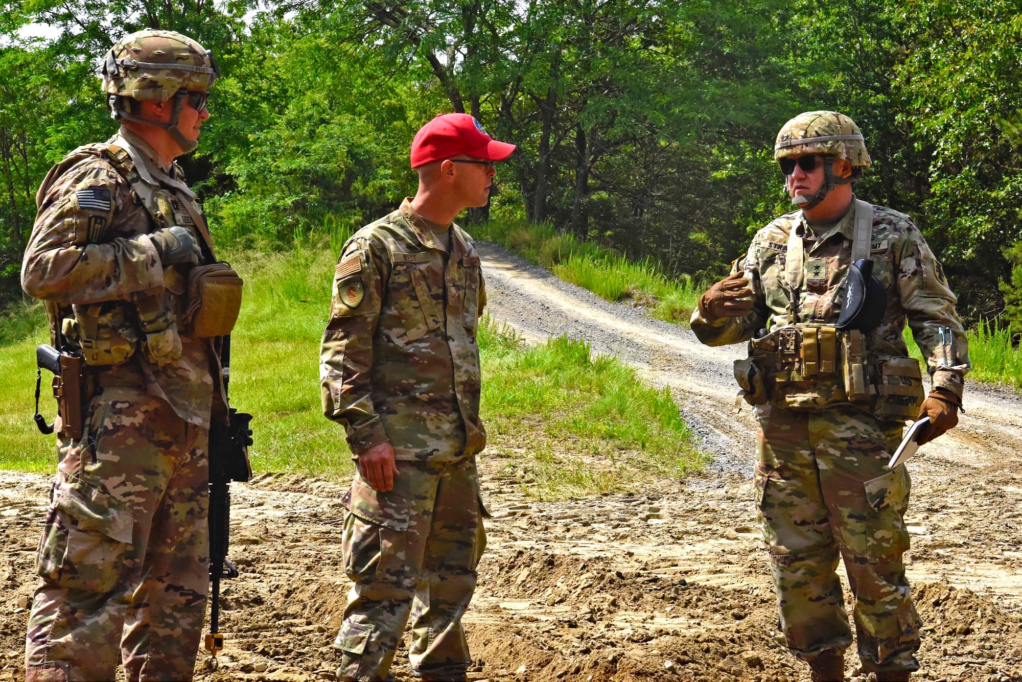 U.S. Army Maj. Gen. Stephen Strand, 412th Theater Engineer commanding general, speaks to a 201st Red Horse Engineer Airman at Joint-Base McGuire-Dix-Lakehurst, N.J., June 12, 2021, about the joint partnership roles each service filled during the Castle IRC exercise. Both the Army and Air Force worked together on installation related construction in preparation for the new Joint Light Tactical Vehicle’s arrival to JB MDL. (U.S. Air Force photo by Staff Sgt. Sabatino DiMascio