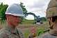 U.S. Army Col. Jon Brierton, Army Support Activity Dix, commander, discusses construction techniques with another solider during the Castle Installation Related Construction exercise on Joint Base McGuire-Dix-Lakehurst, N.J., June 14, 2021. The 668 Engineer Vertical Construction Company out of New Windsor, N.Y., conducted their Reserve Annual Training by overhauling the vehicle training site in preparation for the brand new incoming Joint Light Tactical Vehicles.