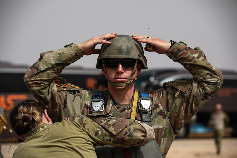 A U.S. Army Jumpmaster assigned to the 19th Special Forces Group conducts a Jumpmaster Personnel Inspection on a Soldier’s equipment for a joint jump with the Utah National Guard’s 19th Special Forces Group (Airborne) and Royal Moroccan Army Paratroopers at Ben Guerir Air Base, Morocco, June 10, 2021.