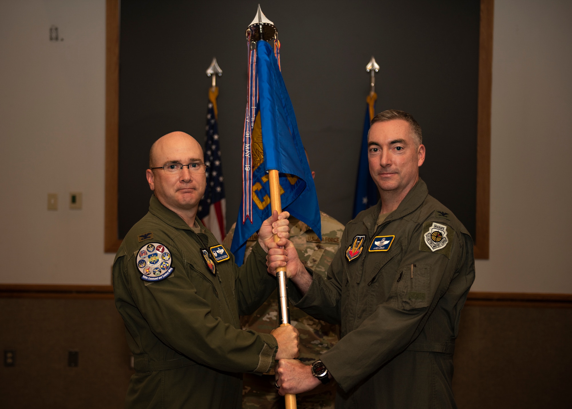 Air Force colonel passes unit guidon to Air Force colonel