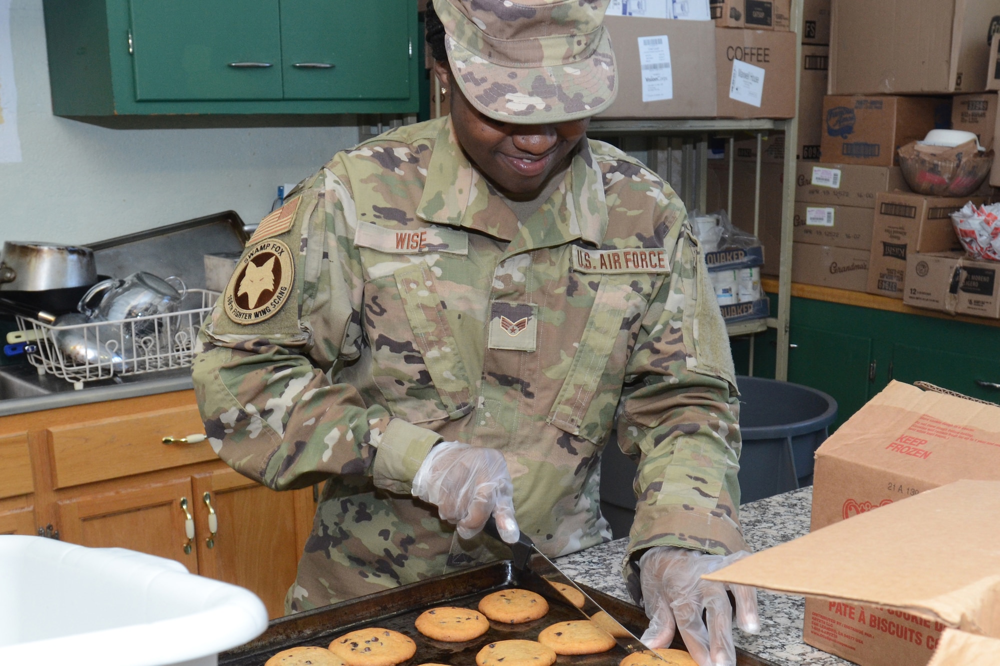 U.S. Air Force Senior Airman Nataiza, a food services specialist assigned to the 169th Fighter Wing, McEntire Joint National Guard Base, South Carolina, supports Operation Healthy Delta, a Department of Defense sponsored Innovative Readiness Training program designed to provide military training opportunities by providing key services to local citizens. Wise is preparing food for the military personnel working at Caruthersville, Missouri June 15, 2021. (U.S. Air National Guard photo by Lt. Col. Jim St.Clair, 169th Fighter Wing Public Affairs)