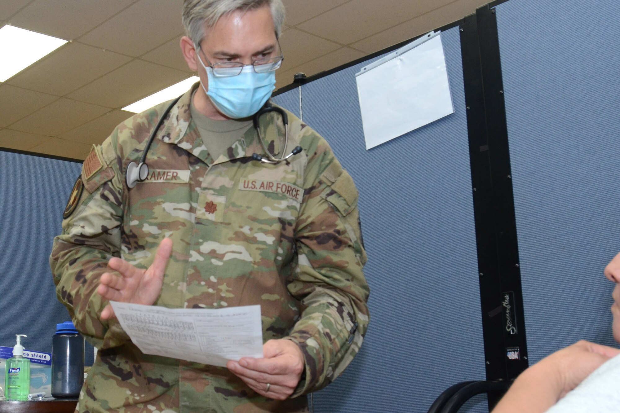 U.S. Air Force Staff Sgt. Jennifer Heller, assigned to the 169th Fighter Wing, McEntire Joint National Guard Base, South Carolina, supports Operation Healthy Delta, a Department of Defense sponsored Innovative Readiness Training program designed to provide military training opportunities by providing key services to local citizens. Heller is administering an eye exam at Sikeston, Missouri June 15, 2021. (U.S. Air National Guard photo by Lt. Col. Jim St.Clair, 169th Fighter Wing Public Affairs)