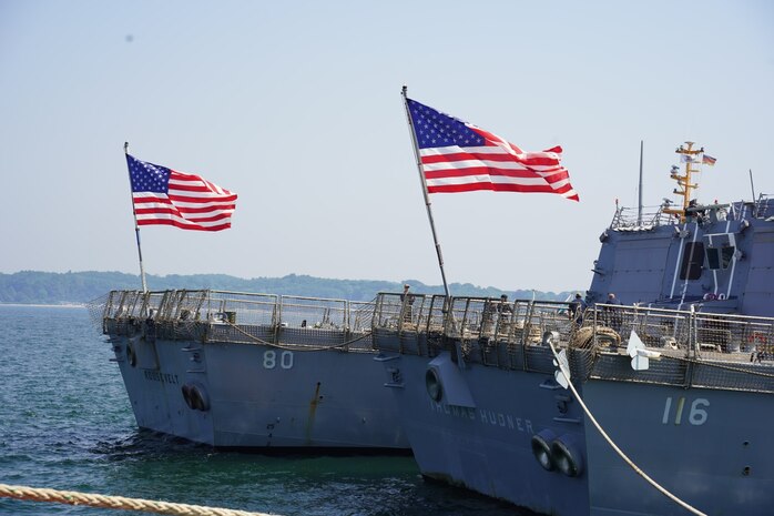 210618-N-NO901-0226 KIEL BAY, Germany, (June 18, 2021) The Arleigh Burke-class guided-missile destroyers USS Roosevelt (DDG 80), and USS Thomas Hudner (DDG 116), nest in Kiel Bay, Germany, after completing exercise BALTOPS 50. BALTOPS 50 is an annual international maritime-led joint exercise including 16 NATO allies and 2 partner nations demonstrating the ability of the alliance to contribute to deterring and if required defeating aggression. (U.S. Navy photo by U.S. Thomas Hudner Public Affairs/Released)