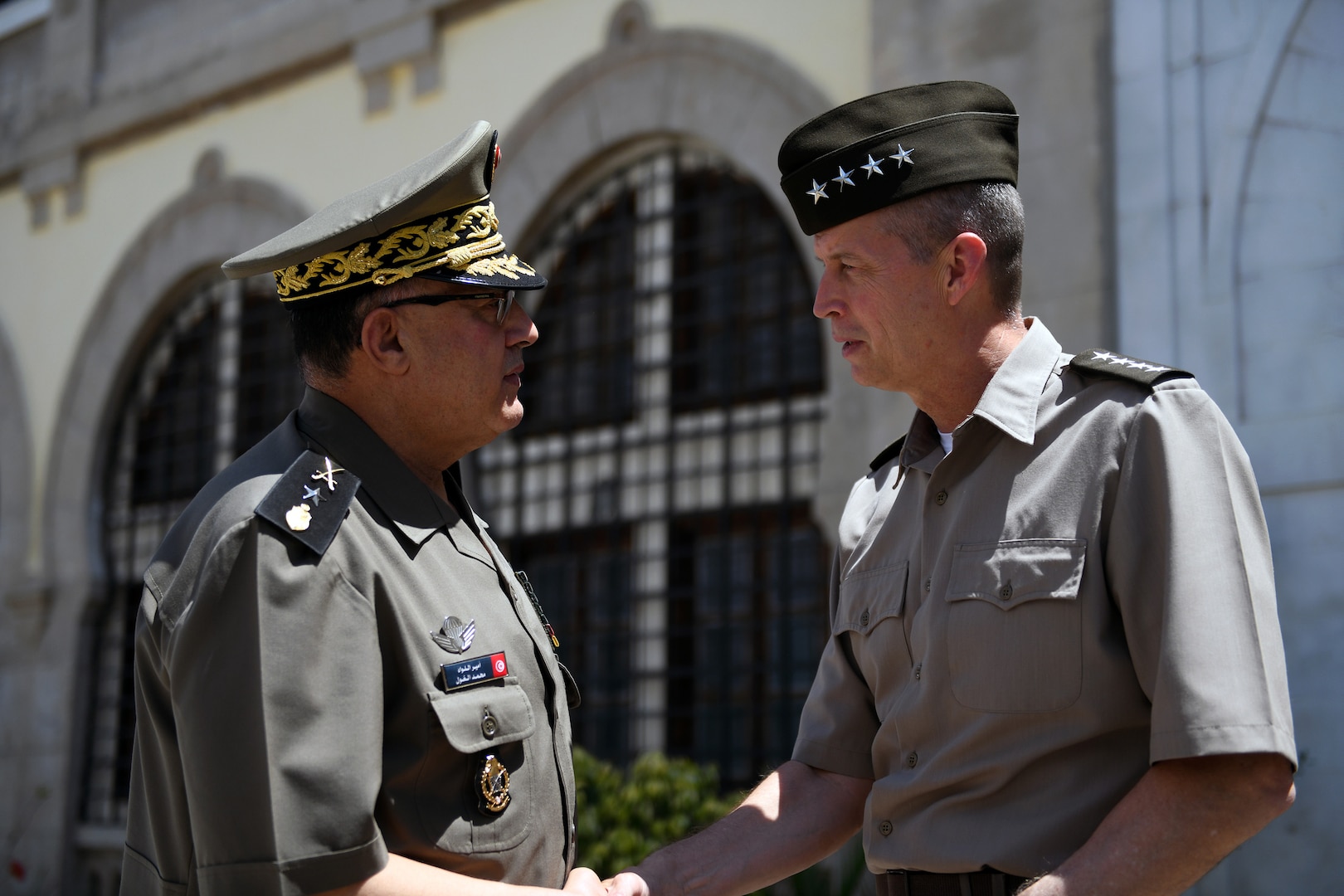 Army Gen. Daniel Hokanson, chief, National Guard Bureau, talks with Brig. Gen. Mohamed El Ghoul, army chief of staff, Tunisian Land Forces, Carthage, Tunisia, June 16, 2021. Tunisia is paired with the Wyoming National Guard in the Department of Defense National Guard State Partnership Program.