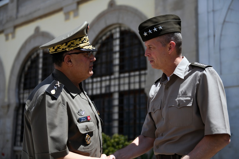 Army Gen. Daniel Hokanson, chief, National Guard Bureau, talks with Brig. Gen. Mohamed El Ghoul, army chief of staff, Tunisian Land Forces, Carthage, Tunisia, June 16, 2021. Tunisia is paired with the Wyoming National Guard in the Department of Defense National Guard State Partnership Program.