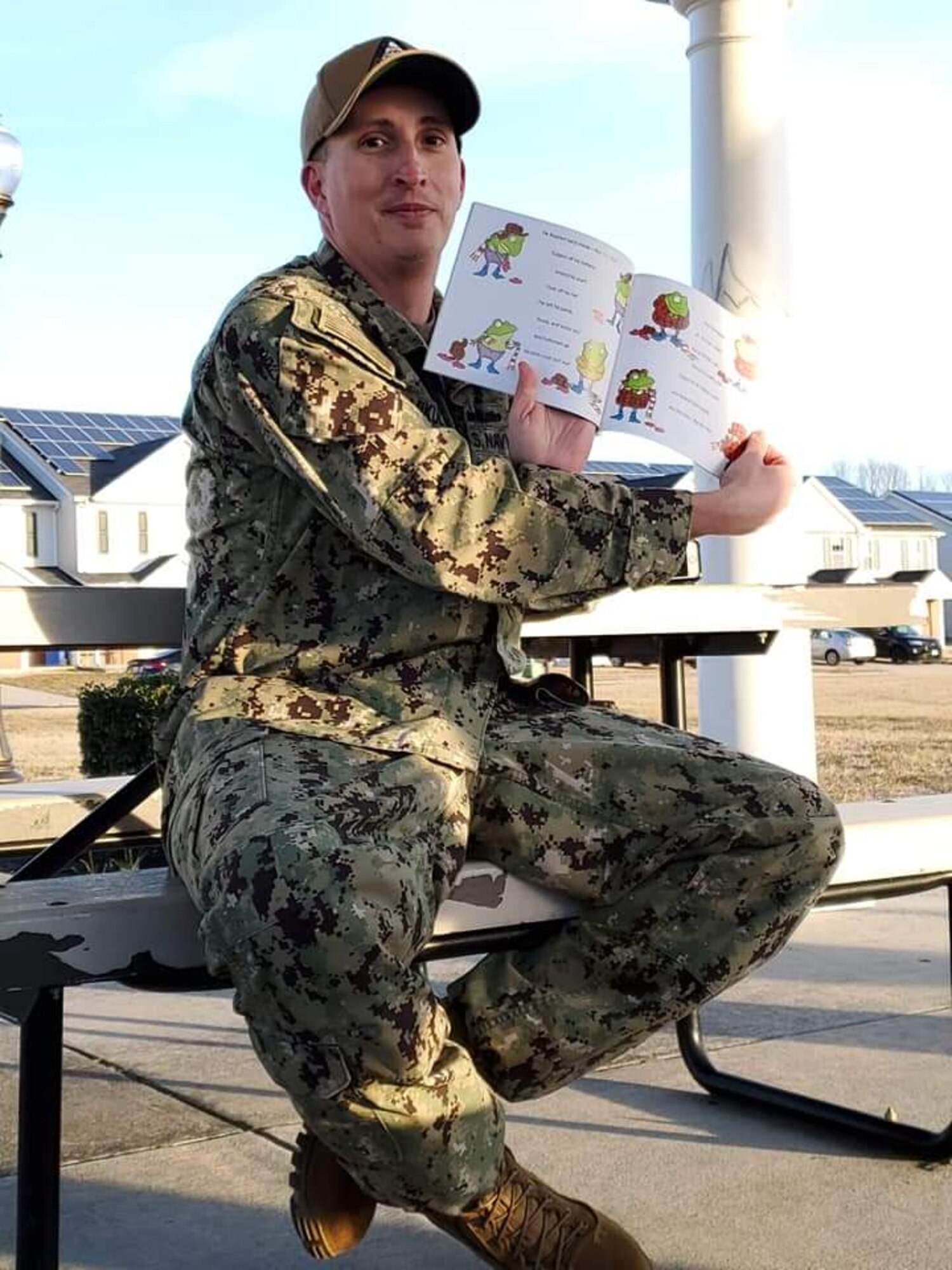 A Sailor from Naval Support Activity, Lakehurst, participates in the United Through Reading program. (Courtesy photo)