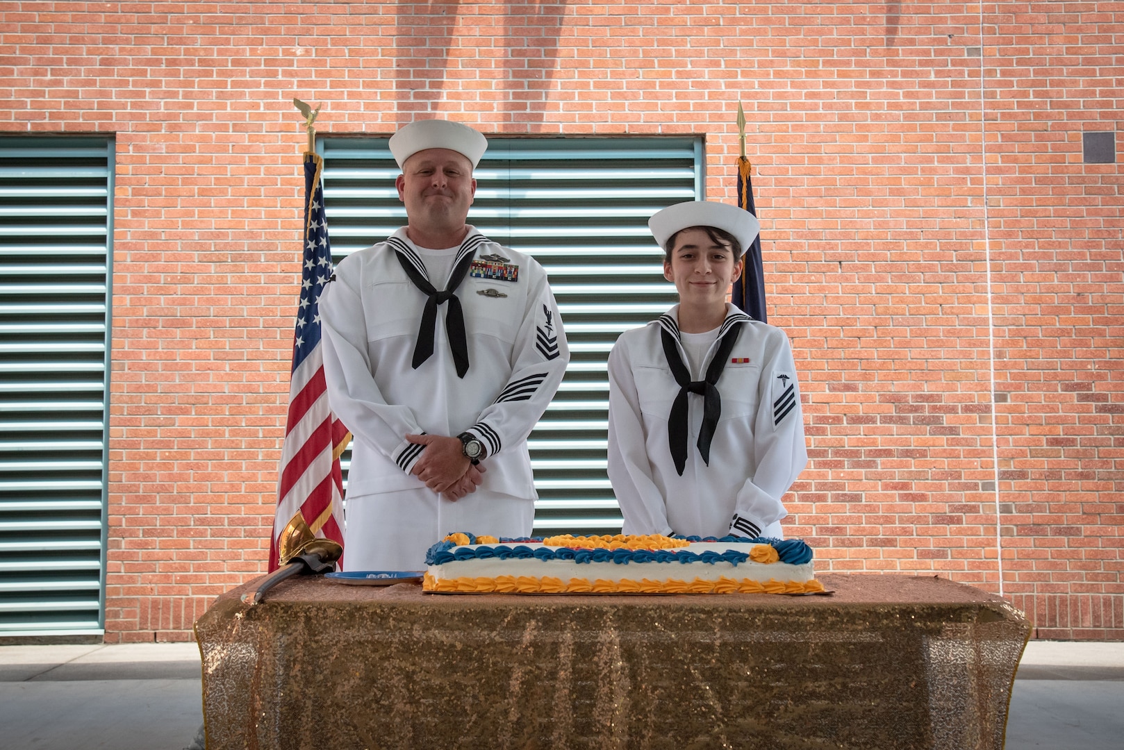 Petty Officer 1st Class Jeremy Mullen, left, and Seaman Jaleana Turcotte, right, the oldest and youngest Corpsman serving aboard Naval Health Clinic Cherry Point, cut a specially made cake during a ceremony honoring the 123rd anniversary of the establishment of the U.S. Navy Hospital Corps held Thursday, June 17, 2021 aboard Marine Corps Air Station Cherry Point.