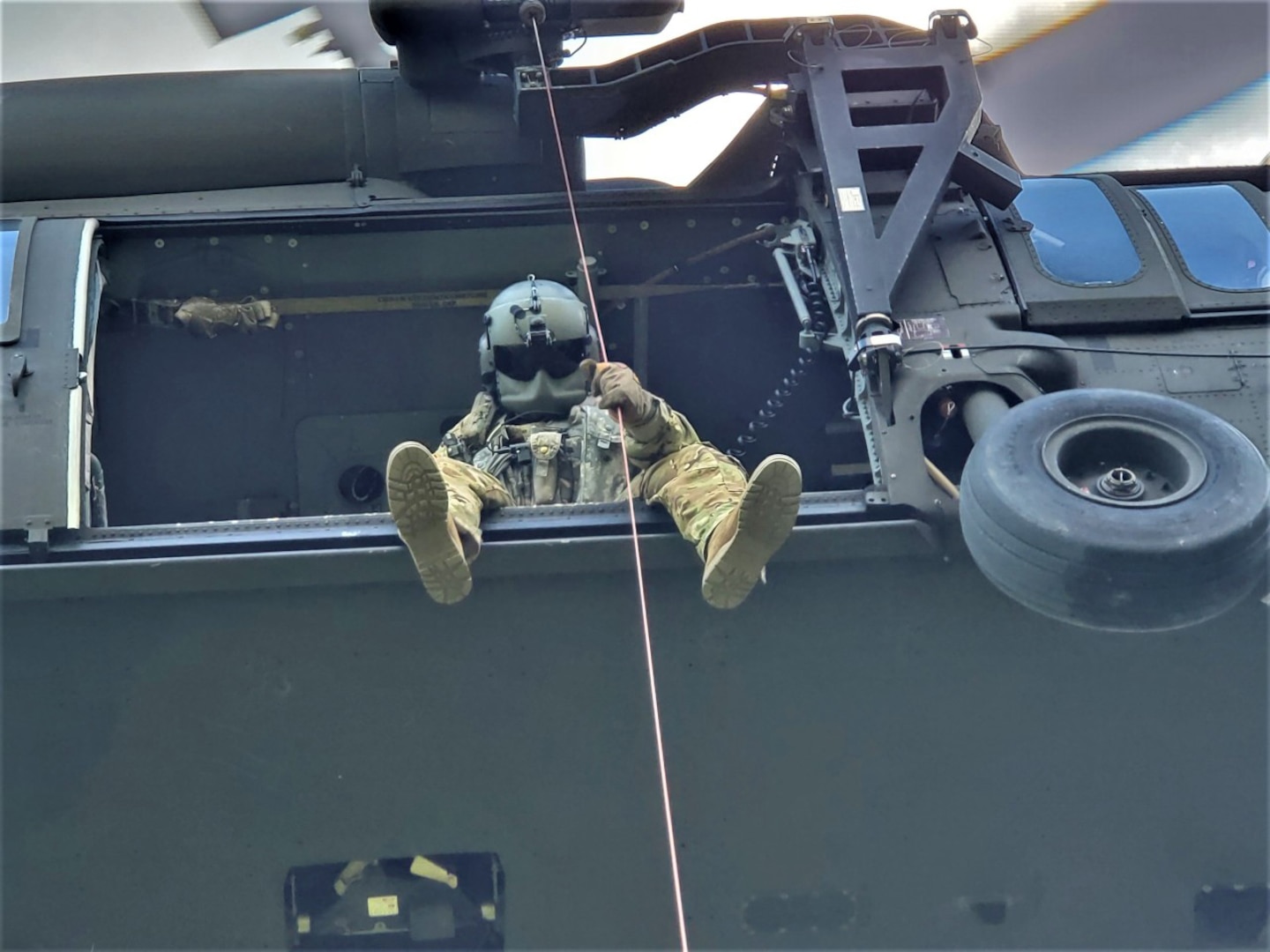 Tennessee National Guard Sgt. Tim Allen lowers Sgt. 1st Class Tracy Banta, a critical care flight paramedic, to a bear attack victim in the Great Smoky Mountains National Park Area June 18.