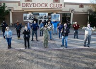 New Norfolk Naval Shipyard (NNSY) team members with Shipyard Commander, Capt. Dianna Wolfson following New Employee Orientation Jan. 19.