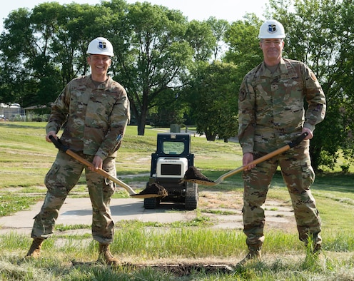 (L to R) Col. Patrick Williams, 557th Weather Wing commander, and Col. Richard Wagner, Deputy Director of Air Force Weather, who served as the 557th WW vice commander from 2016 - 2019, break ground on June 16, 2021 for a $4.1 million backup generator project at Offutt Air Force Base, Nebraska.