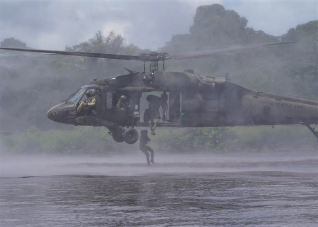Members of the Guyana Defence Force perform helocast training.