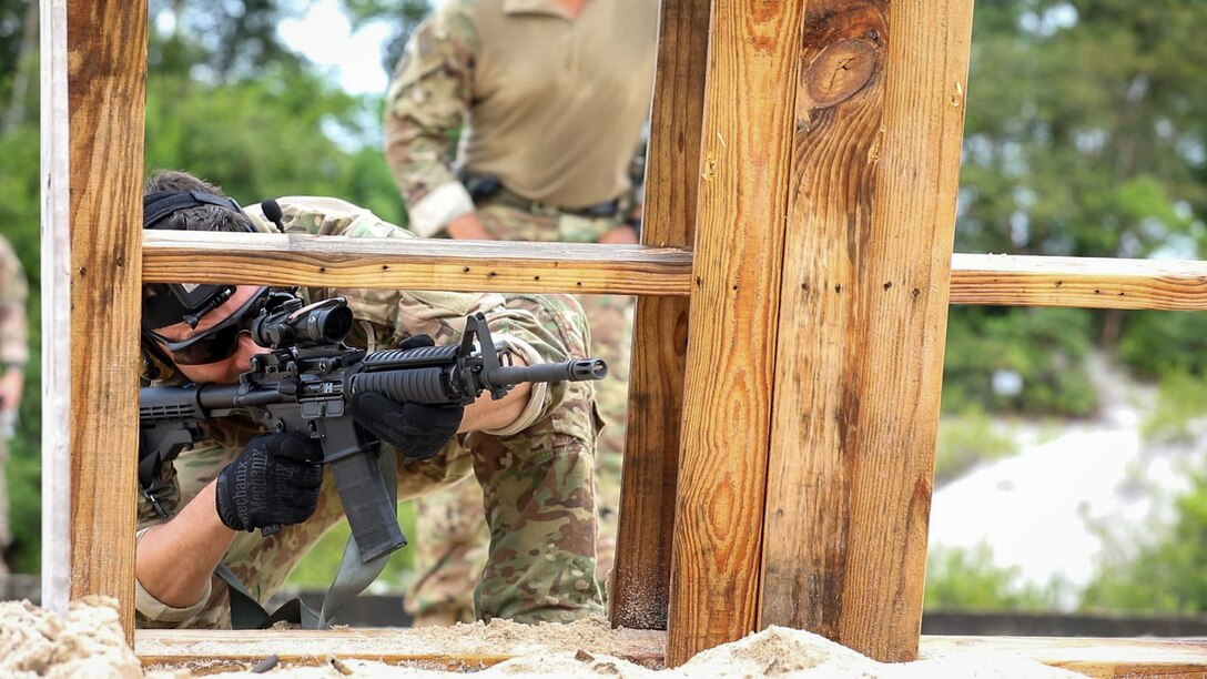 A U.S. Soldier with 2-54th Security Force Assistance Brigade (SFAB) participates in live-fire range during Tradewinds 2021, Camp Stephenson, Guyana, June 17.