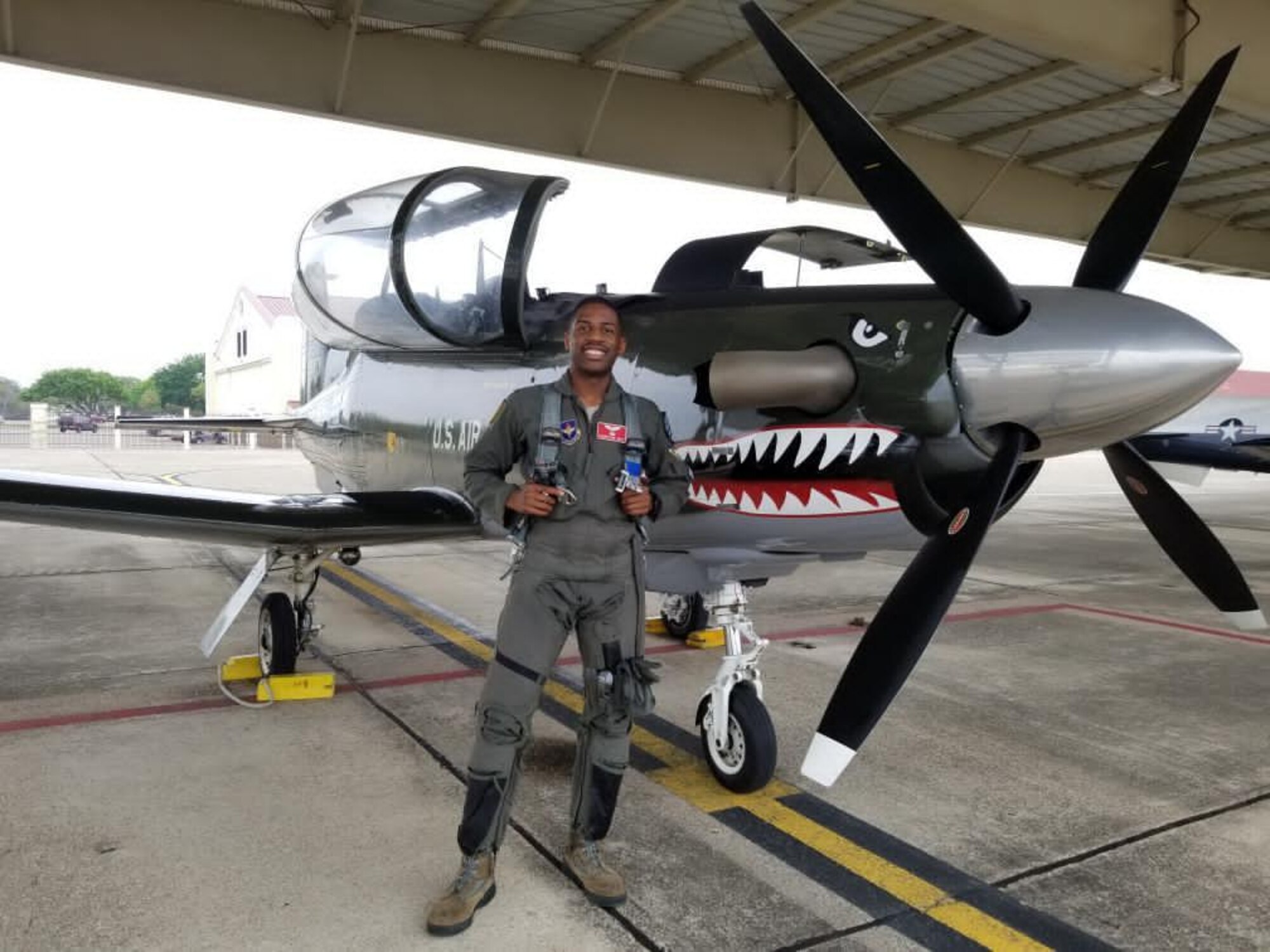 1Lt. Courtland White stands in front of air frame