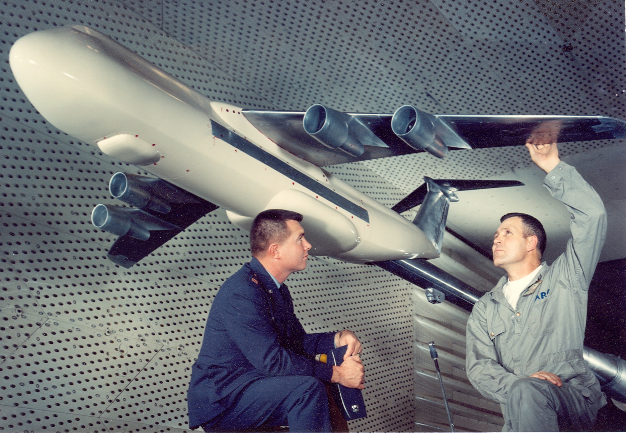 One of the first C-5A models is given a final inspection before testing in the Arnold Engineering Development Complex 16-foot transonic wind tunnel at Arnold Air Force Base in the mid-1960s. The wind tunnel, also known as 16T, is part of the AEDC Propulsion Wind Tunnel facility. PWT was designated as an International Historic Mechanical Engineering Landmark in 1989. (U.S. Air Force photo)