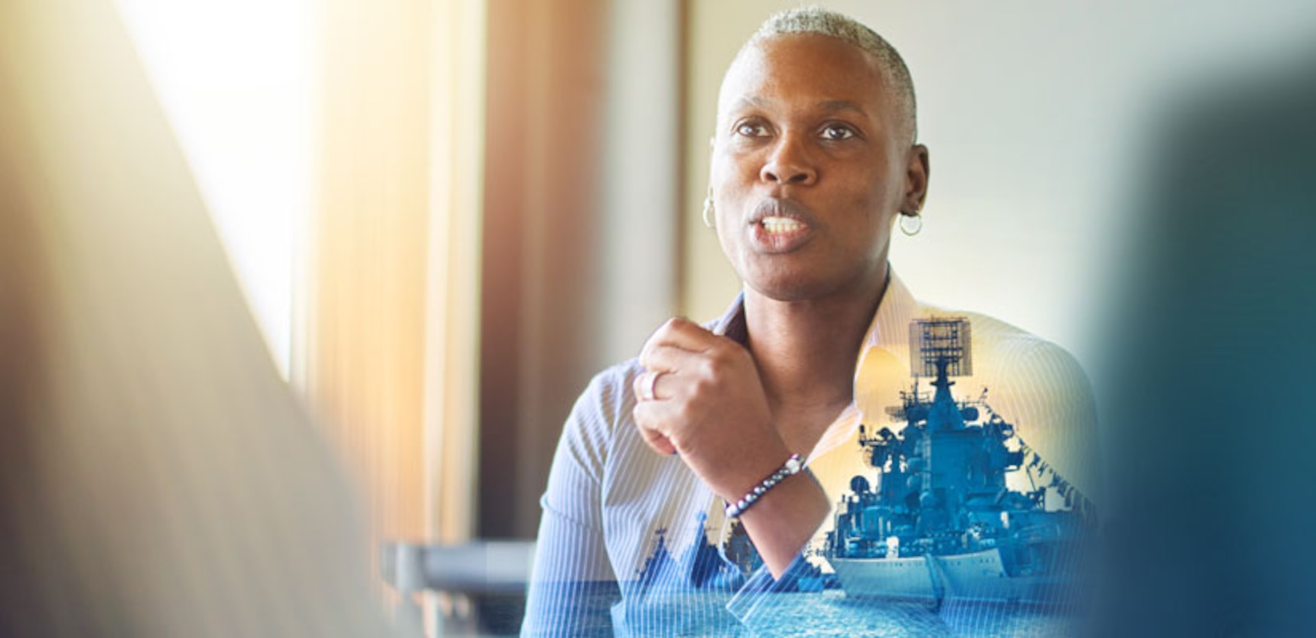 Professional women with a ship inlaid over top