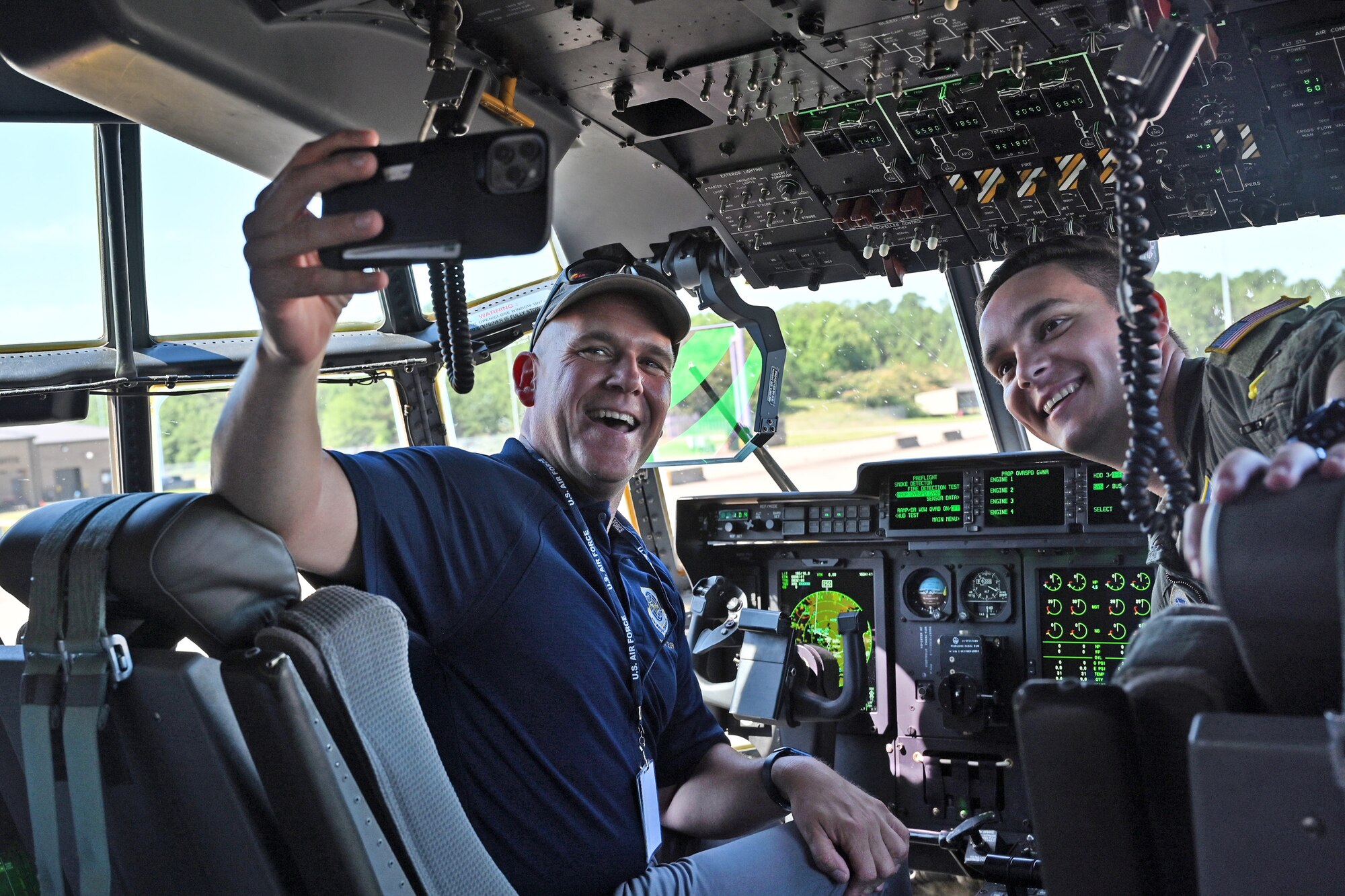 Mark Lillis, Air Mobility Command Civic Leader representing Travis Air Force Base, California, takes a selfie in the cockpit of a C-130J Super Hercules
