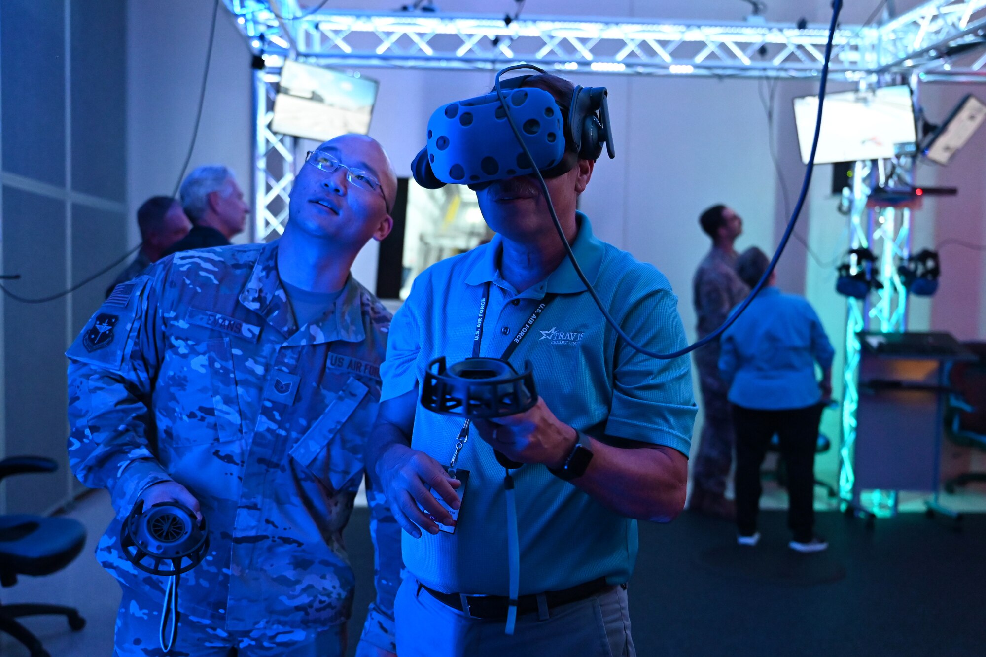 Barry Nelson, Air Mobility Command Civic Leader representing Travis Air Force Base, California, tours the virtual reality maintenance hangar