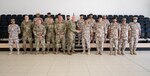 Members of the West Virginia National Guard and the Qatar Emiri Land Forces at QELF headquarters in Doha, Qatar, June 21, 2021. West Virginia and Qatar formalized their partnership during the visit with Qatari Armed Forces as a part of the National Guard Bureau's State Partnership Program.