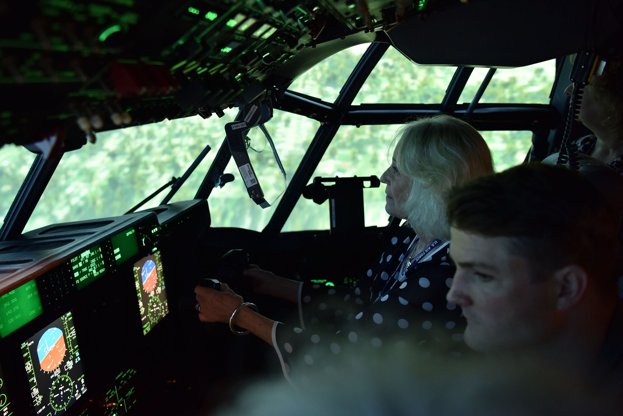 Yvonne Batts, Air Mobility Command Civic Leader representing Dyess Air Force Base, Texas, flies a C-130J Super Hercules simulator