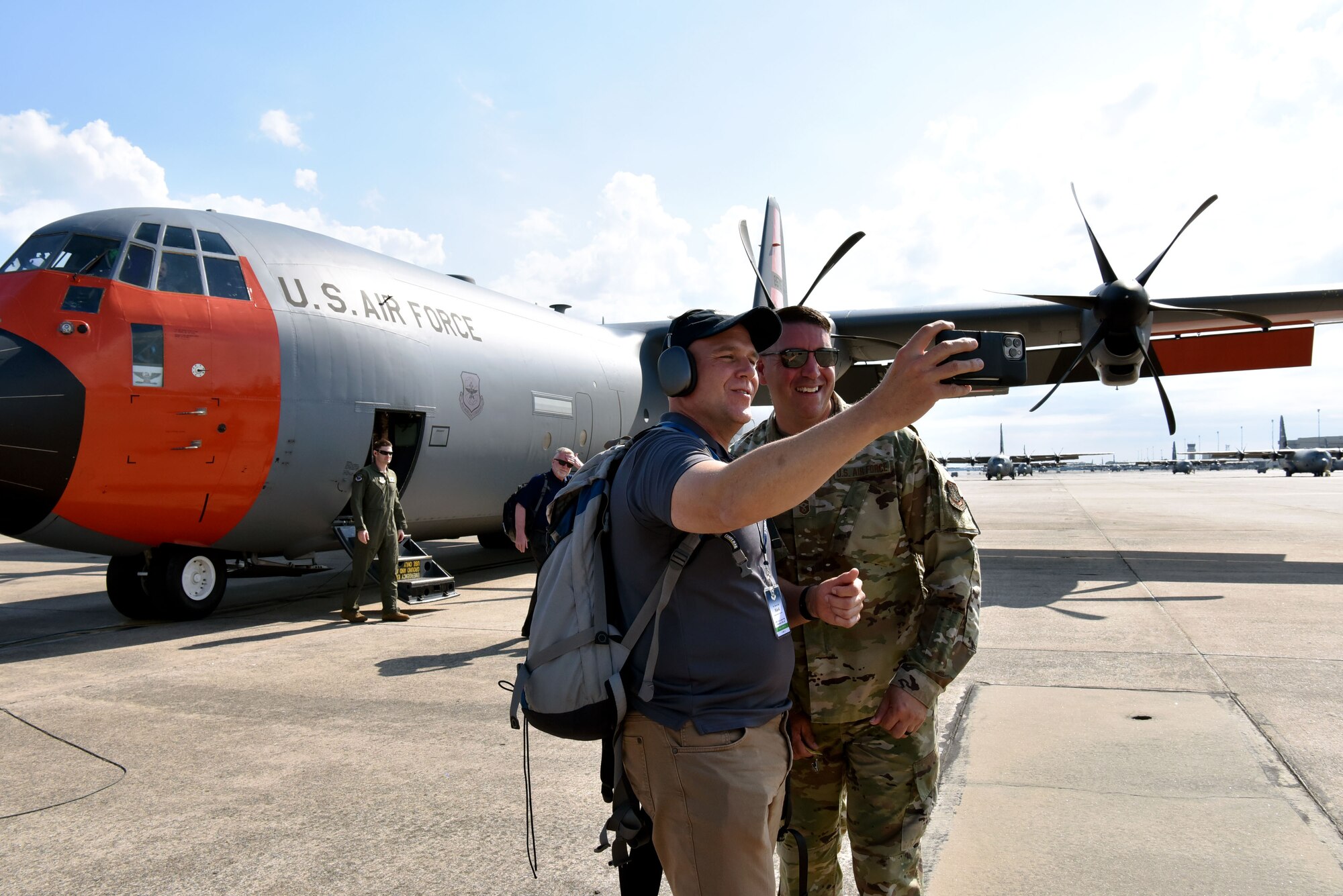Mark Lillis, Air Mobility Command Civic Leader representing Travis Air Force Base, California, takes a selfie with Chief Master Sgt. Steven Hart, 19th Airlift Wing command chief