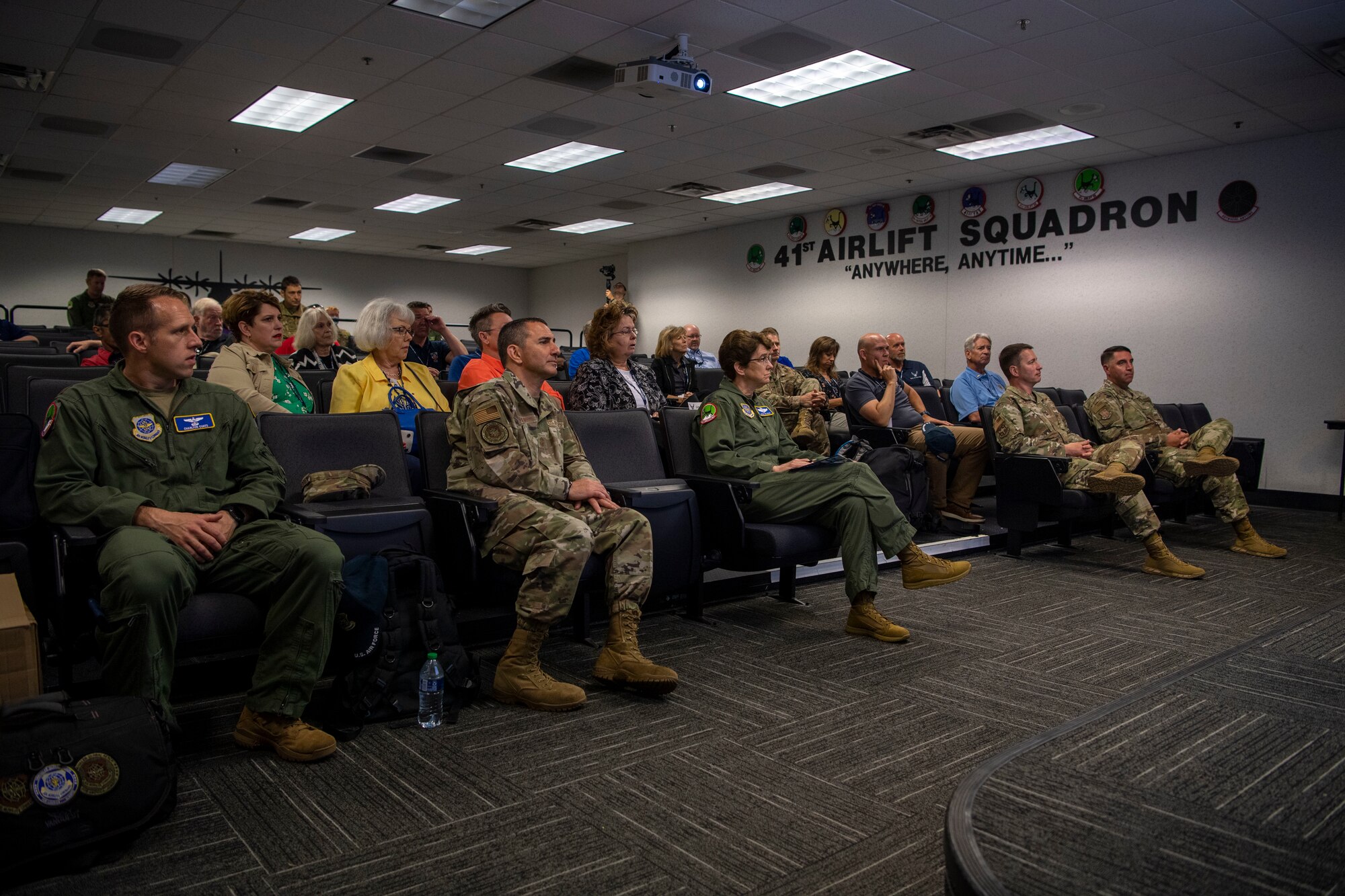 Gen. Jacqueline Van Ovost, Air Mobility Command commander, and AMC’s Civic Leaders receive a briefing