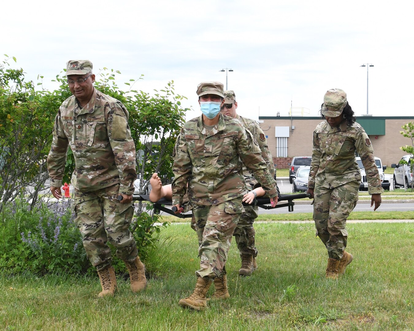 Airmen assigned to the New York Air National Guard's 106th Rescue Wing Medical Group transport a simulated casualty during a training exercise at Gabreski Air National Guard Base in Westhampton Beach, New York, June 11, 2021. Twenty-two Airmen took part in the advanced trauma assessment training June 6-11.