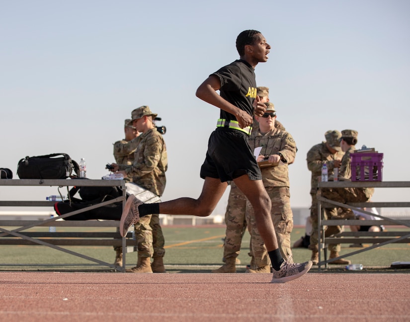 Sgt. Ellahimod Alexander, a human resources noncommissioned officer assigned to Area Support Group - Kuwait, crosses the finish after completing the two-mile run during the Army Combat Fitness Test for the U.S. Army Central 2021 Best Warrior Competition at Camp Buehring, Kuwait, June 21, 2021. Competitors from across the ARCENT area or responsibility are competing in various events to be crowned the title of best warrior. (U.S. Army photo by Staff Sgt. True Thao, U.S. Army Central Public Affairs)