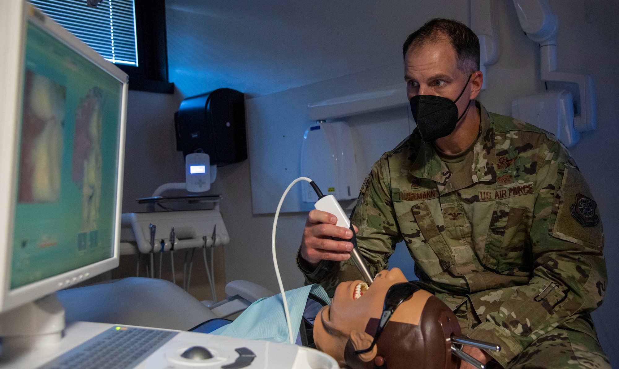 Col. Matt Husemann, 436th Airlift Wing commander, uses computer-aided technology to create a 3D image of a simulated patient’s mouth, during  a 436th Medical Group immersion at Dover Air Force Base, Delaware, June 17, 2021. The immersion gave Husemann hands-on experience of 436th MDG operations. (U.S. Air Force photo by Tech. Sgt. Nicole Leidholm)